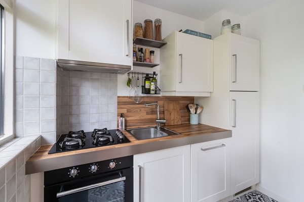 Foto - Te koop: Sfeervolle tussenwoning met groene oase!